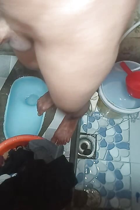 takes a shower and masturbates