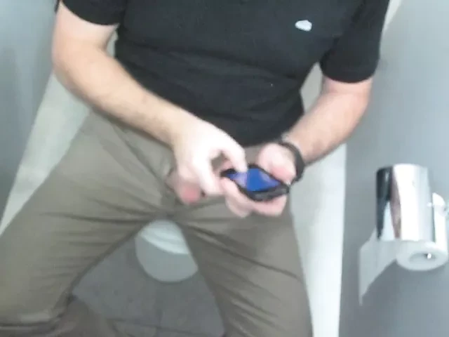 Jerking off in the public toilet at work