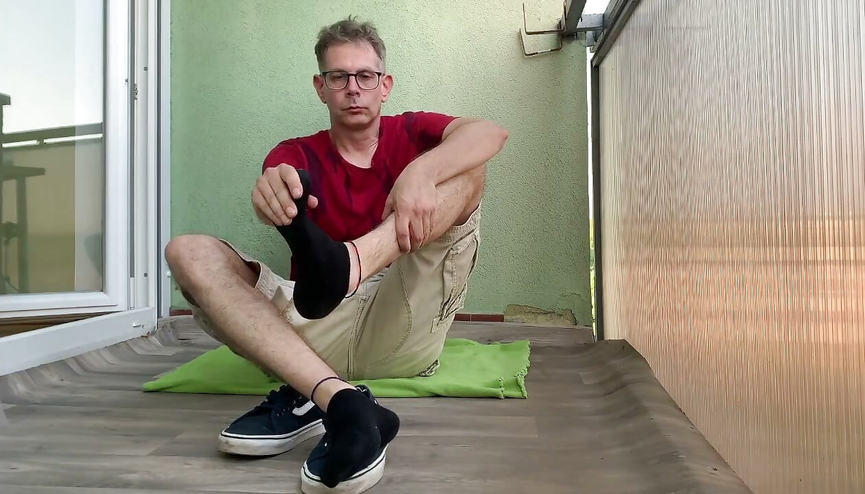 Foot show (Shoe and sock taking off NOn explicit video)