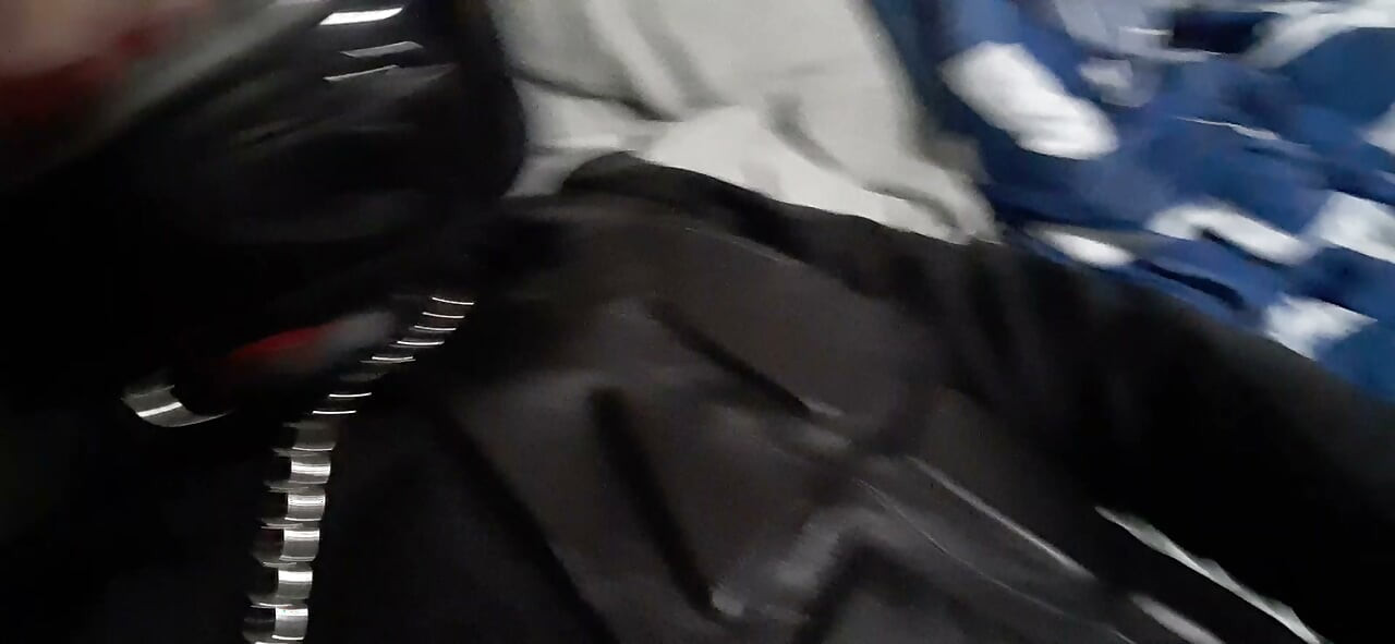 Biker cums in leather moto race suit