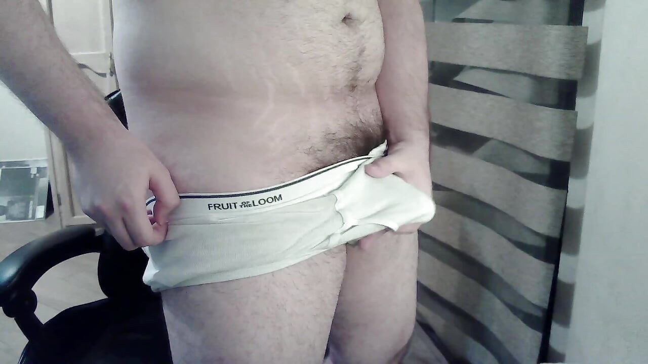 Hot beefy camboy shows off the goods during a show