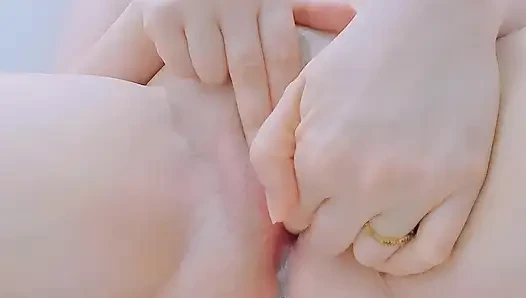 I masturbate with a full bladder until I ejaculate in spurts.
