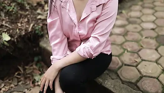 Outdoors, a busty Indian village girl is fucked by a masseuse using oil and creampie