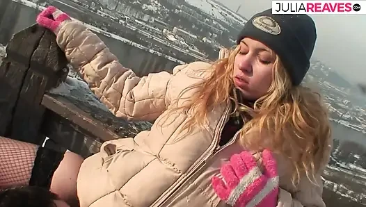 Sexy redhead rides a hard cock out in the cold snow