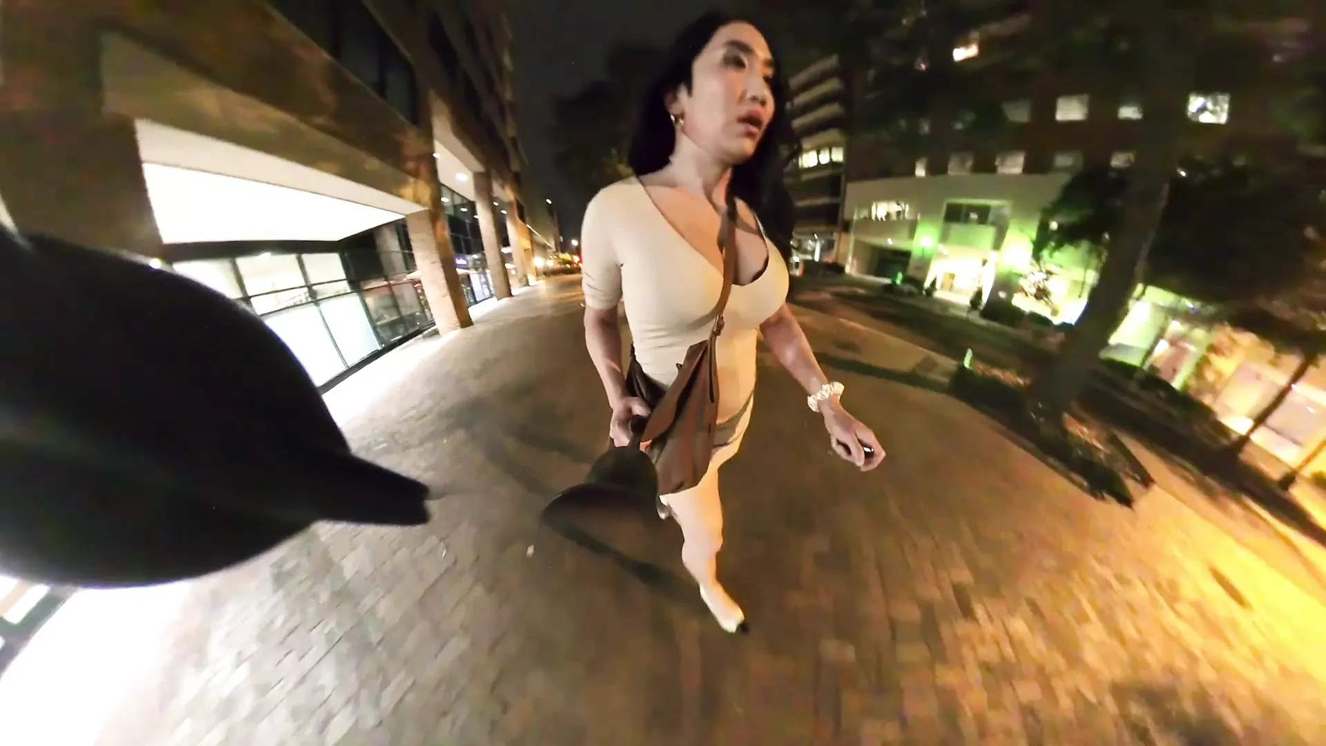 Kelly goes for a walk downtown in a tight slutty dress