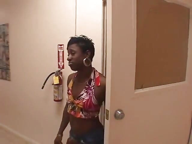 Slender black slut gets her cunt licked by a dude in an office