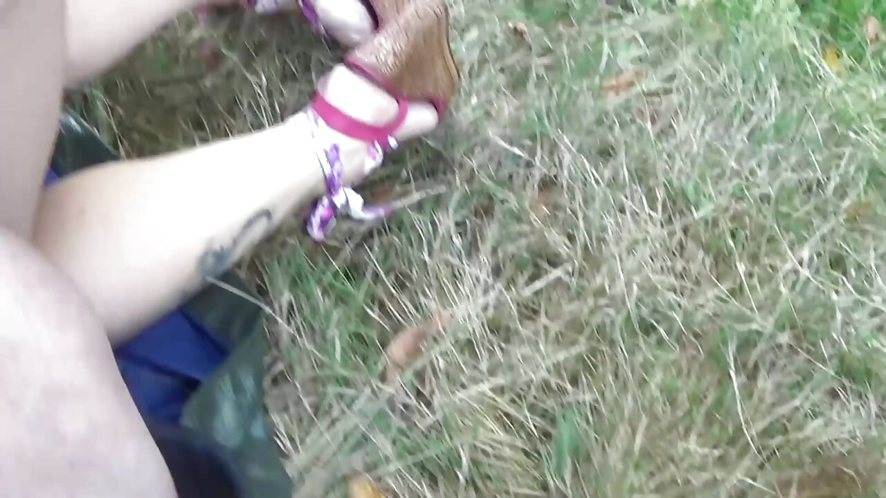 Fucking  a big boob lady on the grass