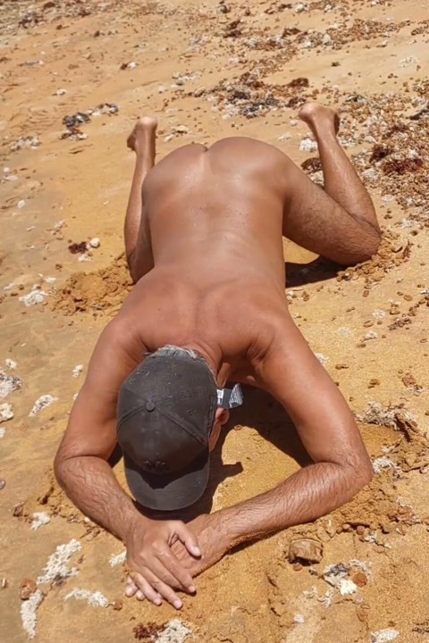 Ladysilva on all fours naked on the beach comes fuck my ass