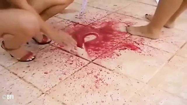 Two wet and messy lesbians pleasuring each other