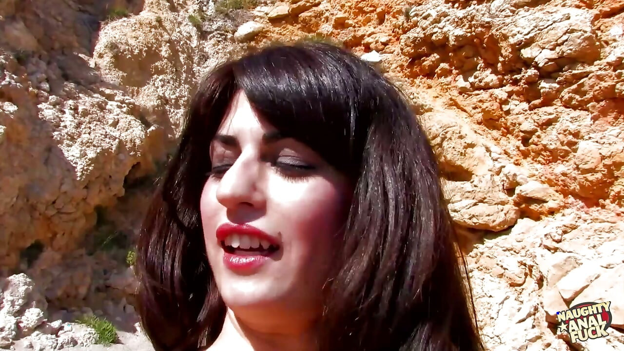 A voluptuous brunette becomes aroused at the beach and chooses to perform oral sex on him.