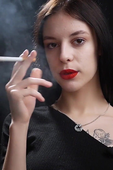 Slim Chick Is Smoking Two Reds