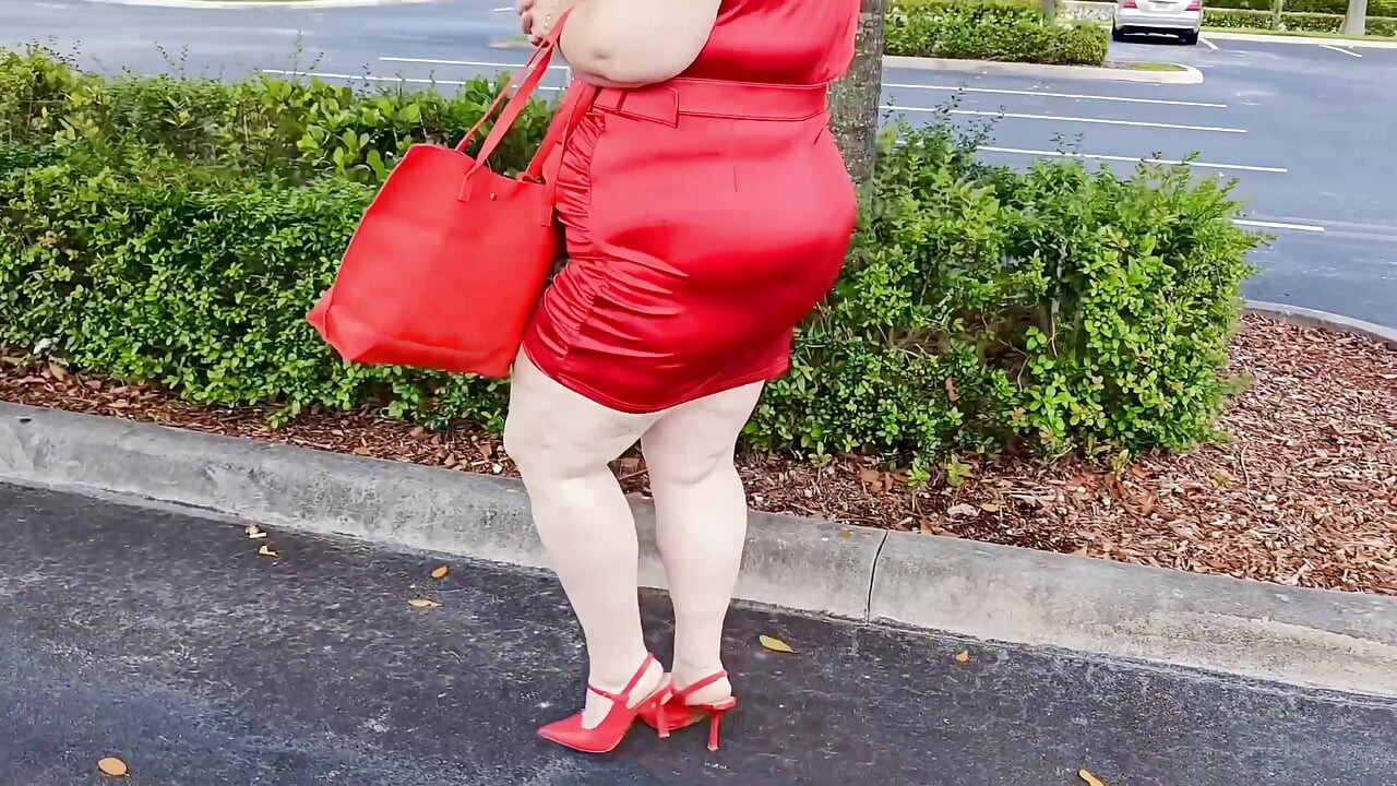 Beautiful Woman Walking Outdoors in  Parking Lot Showing off for Strangers