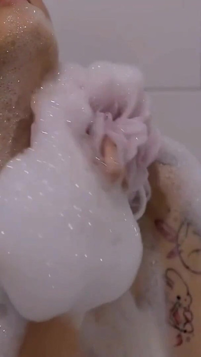 Key moment from "Soft Bubbles, Softer Skin. Naked Under the Bubbles"