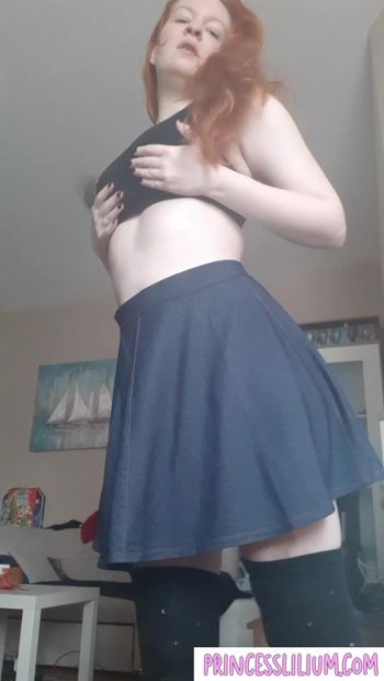 Tease in a skirt, bra and thighhighs!!