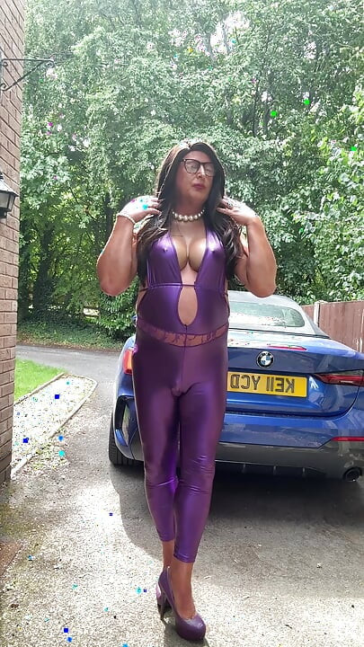 Sexy Crossdresser kellycd2022 in purple pvc catsuit and heels