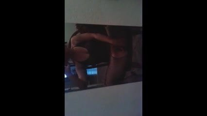 in front of mirror