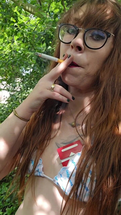 Bikini top redhead blows smoke in your face
