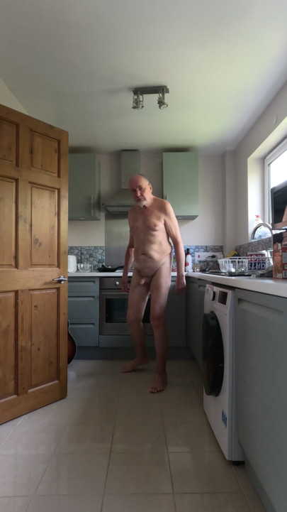 Stripping naked in the kitchen
