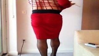 Big boob cross dresser smoking red dress.