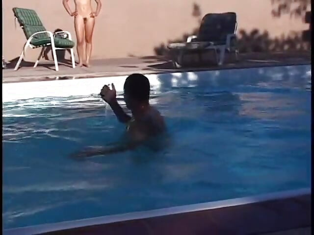 Group of guys by the pool all take turns fucking the brunette