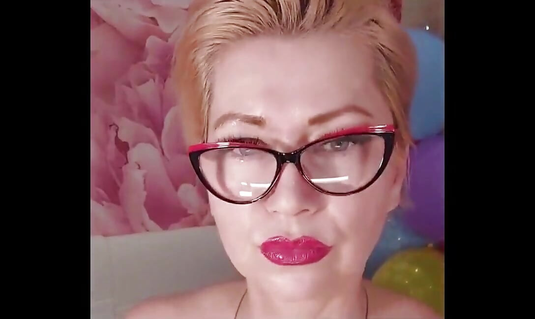 Dildoing of a Mature Bitch on a Background of Colorful Balloons