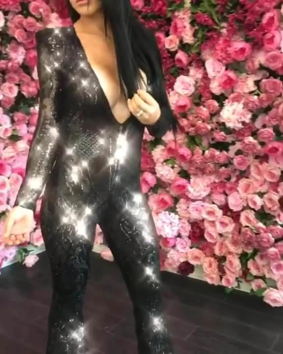 Eva Slinking it around for us all shiny like.