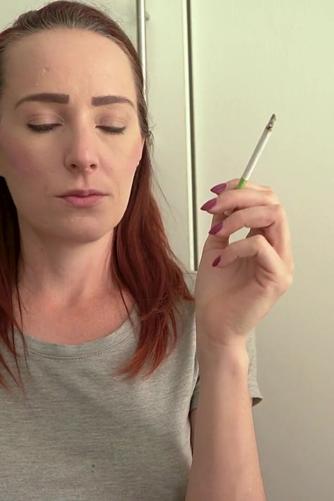 Cute Brunette Smoking in a Tight Top