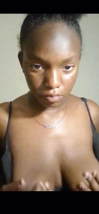 Hot black babe playing with big boobs