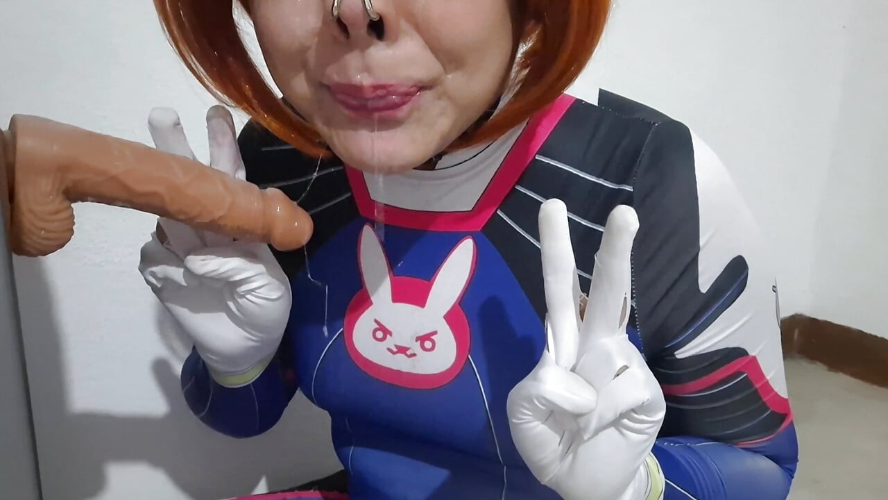 Femboy with Dva Cosplay and BDSM Nosehook Giving a Blowjob, Eating Cum and Deepthroat to Big Dildo