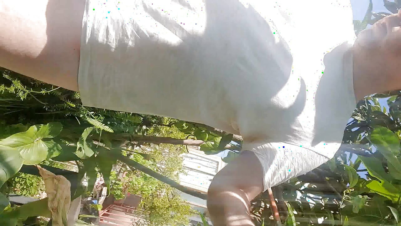 Being completely naked in the garden