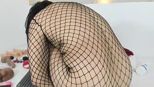 Mature woman fucks her round ass and opens her anus with her favorite dildo