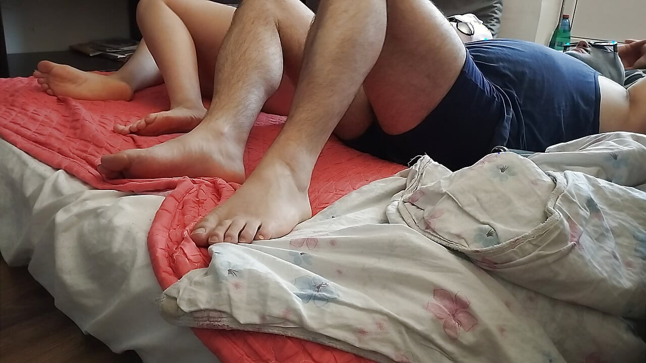 Foreplay in the bedroom with an amateur couple.
