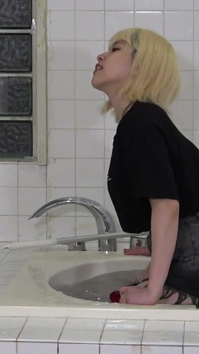 Japenese girl submerges a man into the bathtub with a facesitting | Clip 1