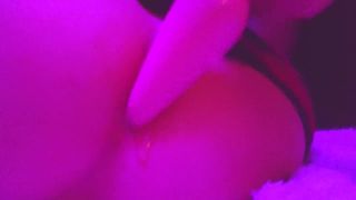 Close-up smooth pink twink butt plug play