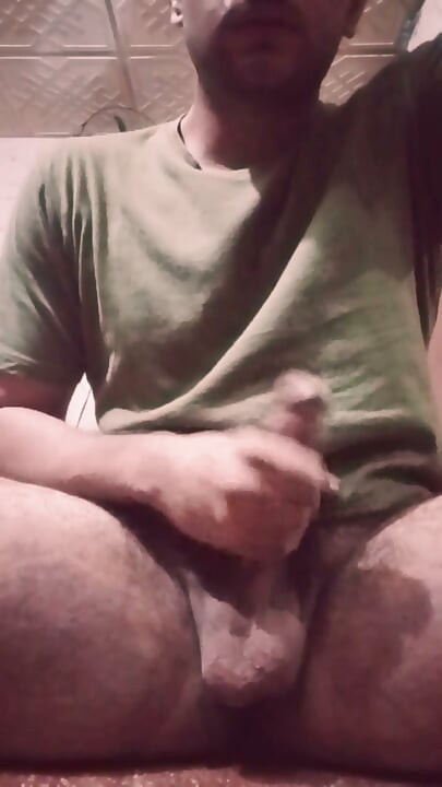 Solo guy masturbating and playing with his dick