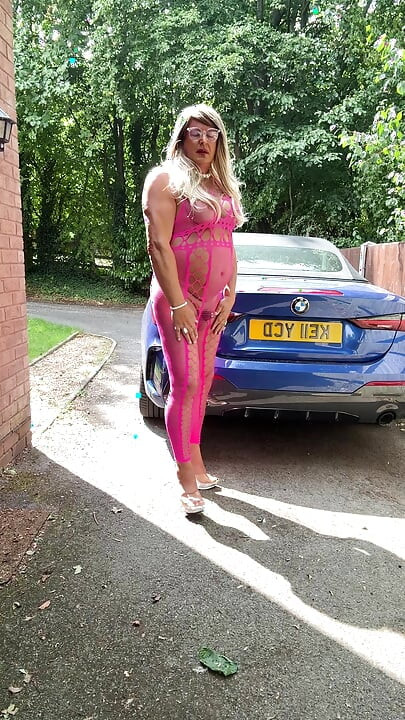 Sexy Crossdresser Kellycd2022's in pink fishnet catsuit and heels
