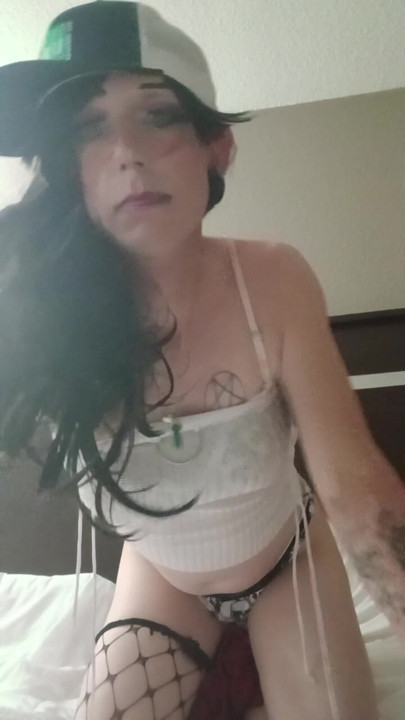 Amatuer Crossdresser Taylor showing off her ass in motel room