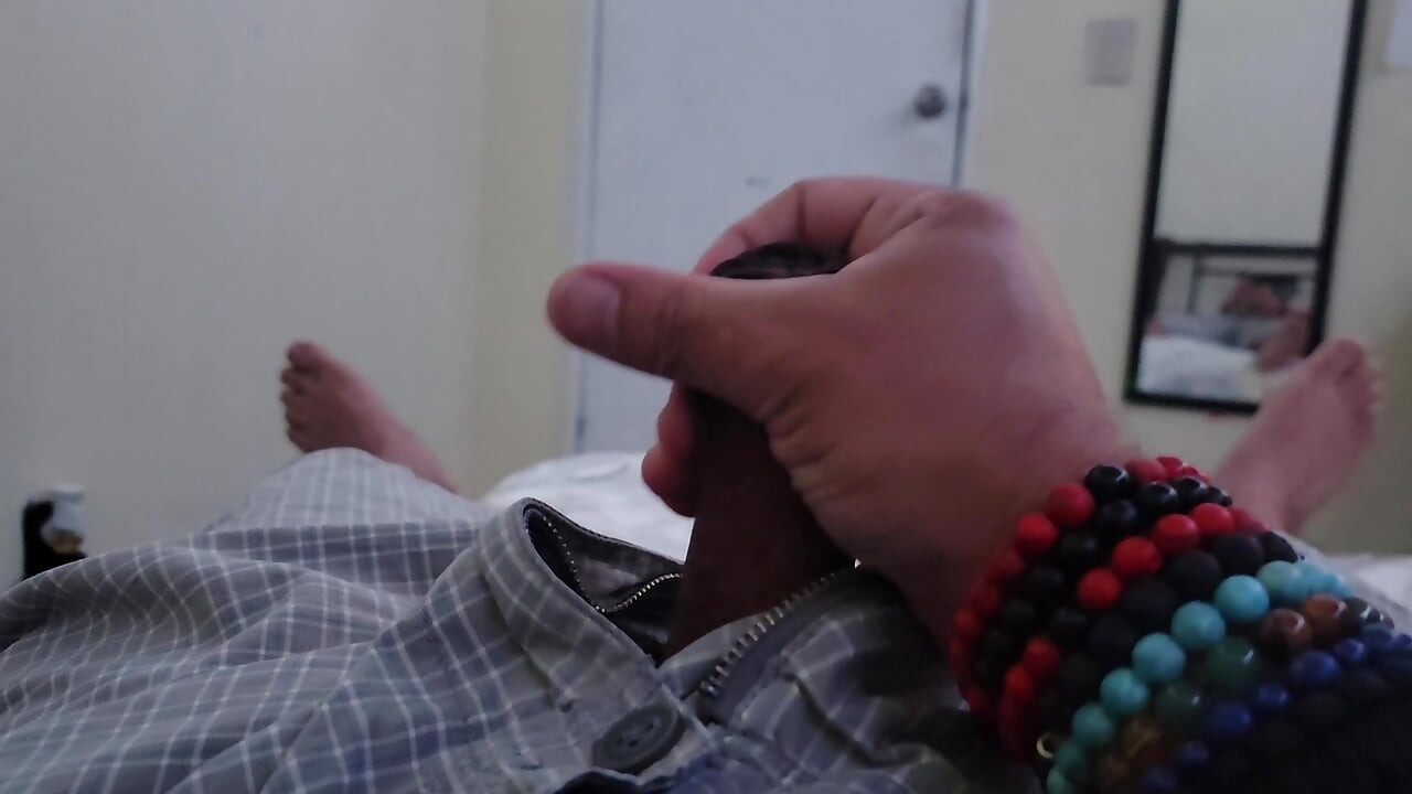 Playing with my dick on bed