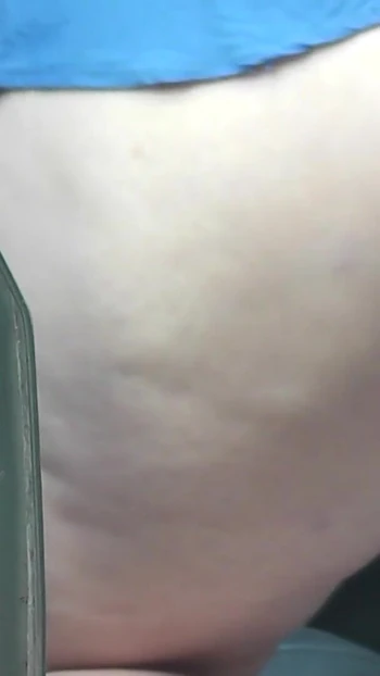Captivating moment from "Sexy MILF in bathrobe without panties cleans interior car in courtyard of house. No panties. Naked"