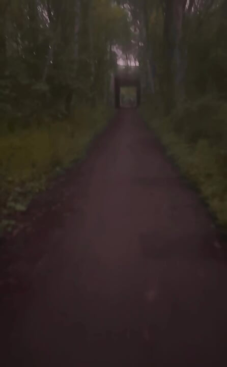 Long naked barefoot walk from car to a welcome to my town sign