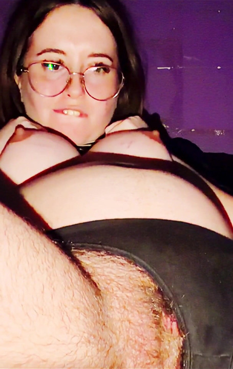 Five-month Pregnant Woman Playing with Her Breasts