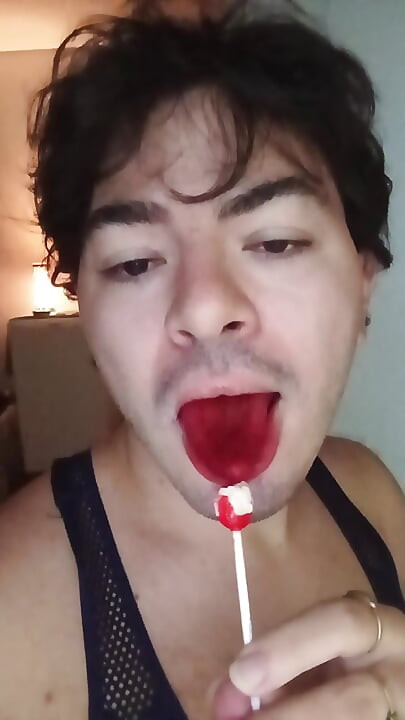 gay femboy sexy skirt lingerie and licking lollipop