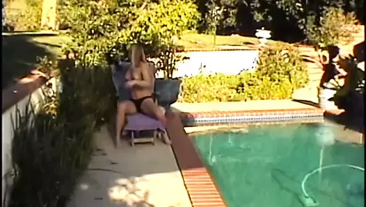 Slut rubs her pussy and dildo fucks her cunt on the lawn chair