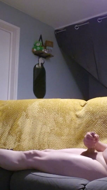 crossdresser layed on sofa playing with her self wearing nothing but her kitten heels and bra | Clip 1