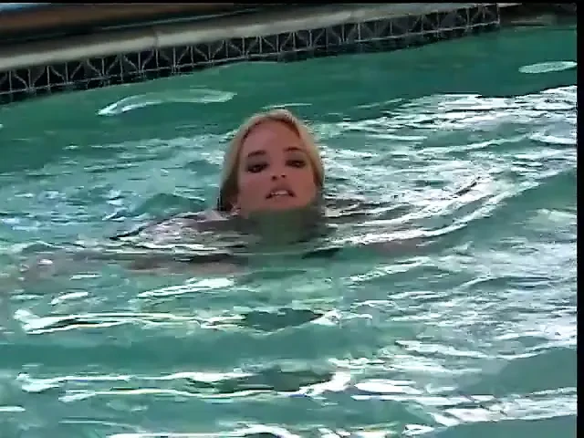 Guy licks, fingers and fucks blonde girl by the pool