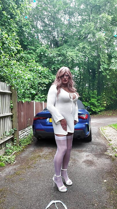 Crossdresser kellycd in white dress stockings and heels