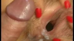 close-up cumshot on hairy gaping cunt