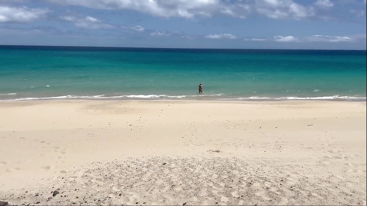 Naked Beach MILF Helps a Jerking Stranger - Cum on Her Ass