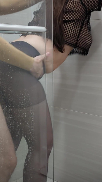 Stunning moment from "Fishnet & Nylons, Shower Sex (c01_film03)"