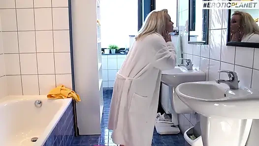 Big blond German girl with big tits bathroom sex